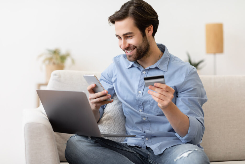 Man using phone to shop online